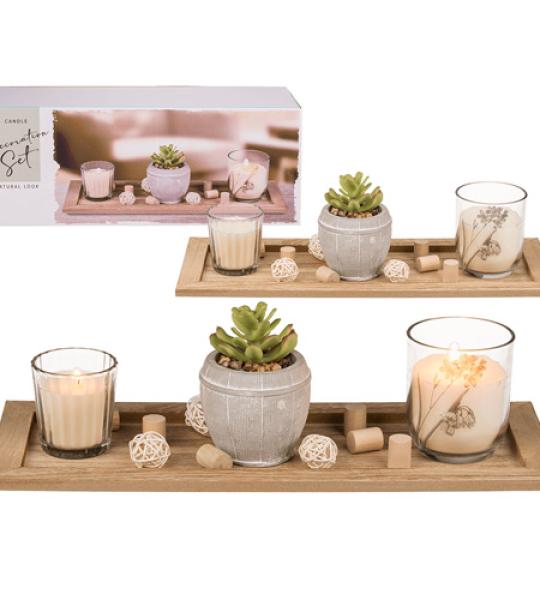 wooden plate with ceramic pot and candle